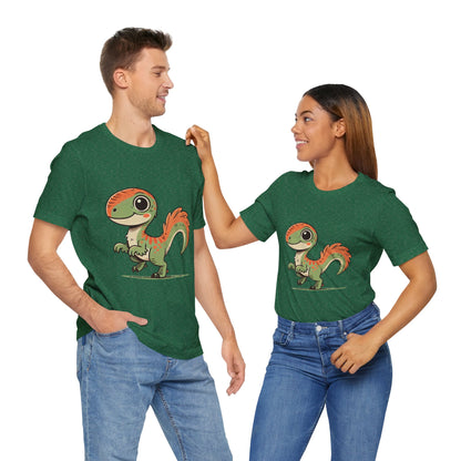 Charming Green & Orange Velociraptor Tee – Dino Delight for All Ages! 🦖🍃🧡 - Unisex Jersey Short Sleeve Tee Super Comfy Dino T-Shirt Gift