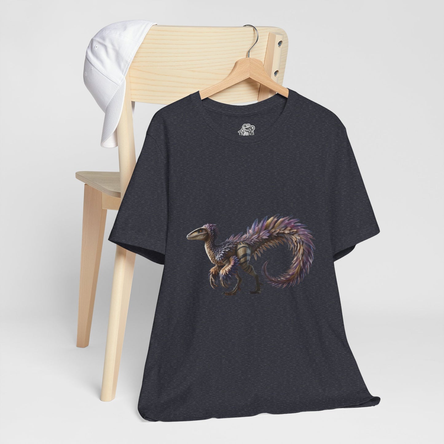 Majestic Feathered Velociraptor Tee – Fierce, Fabulous, and Full of Flair! 🦖💜✨ - Unisex Jersey Short Sleeve Tee Super Comfy Dino T-Shirt Gift