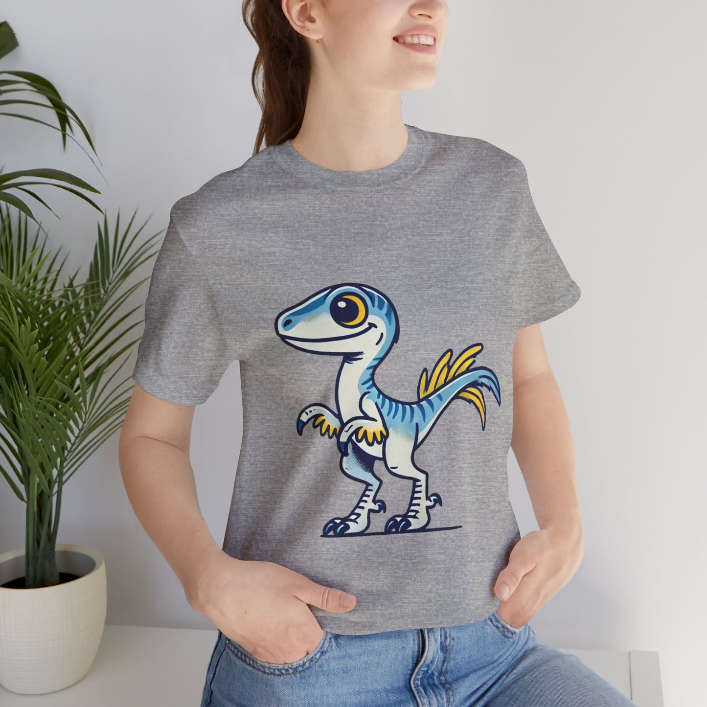 Playful Blue & Yellow Velociraptor Tee – Dino Fun for All Ages! 🦖💙💛 - Unisex Jersey Short Sleeve Tee Super Comfy Dino T-Shirt Gift