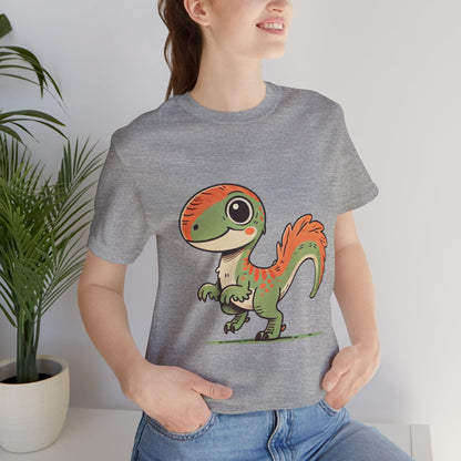 Charming Green & Orange Velociraptor Tee – Dino Delight for All Ages! 🦖🍃🧡 - Unisex Jersey Short Sleeve Tee Super Comfy Dino T-Shirt Gift