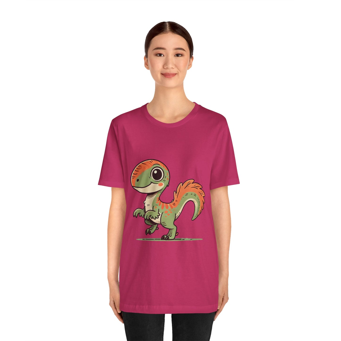 Charming Green & Orange Velociraptor Tee – Dino Delight for All Ages! 🦖🍃🧡 - Unisex Jersey Short Sleeve Tee Super Comfy Dino T-Shirt Gift