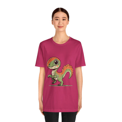 Charming Green & Orange Velociraptor Tee – Dino Delight for All Ages! 🦖🍃🧡 - Unisex Jersey Short Sleeve Tee Super Comfy Dino T-Shirt Gift