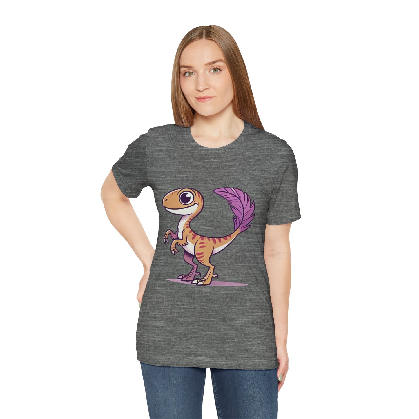 Friendly Feathered Velociraptor Tee – Cute Dino Style with a Splash of Color! 🦖💜🍃 – A Wild Splash of Style and Prehistoric Flair! 🦖💜🌿 - Unisex Jersey Short Sleeve Tee Super Comfy Dino T-Shirt Gift