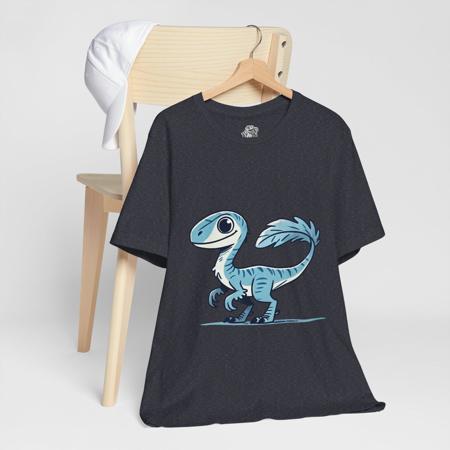 Charming Blue Velociraptor Tee – Cool Dino Style with a Playful Twist! 🦖💙❄️ - Unisex Jersey Short Sleeve Tee Super Comfy Dino T-Shirt Gift