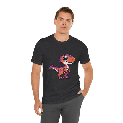 Adorable Cartoon Velociraptor Tee – Cute Dino Fun for All Ages! 🦖💜🧡 - Unisex Jersey Short Sleeve Tee Super Comfy Dino T-Shirt Gift