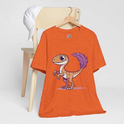 Friendly Feathered Velociraptor Tee – Cute Dino Style with a Splash of Color! 🦖💜🍃 – A Wild Splash of Style and Prehistoric Flair! 🦖💜🌿 - Unisex Jersey Short Sleeve Tee Super Comfy Dino T-Shirt Gift