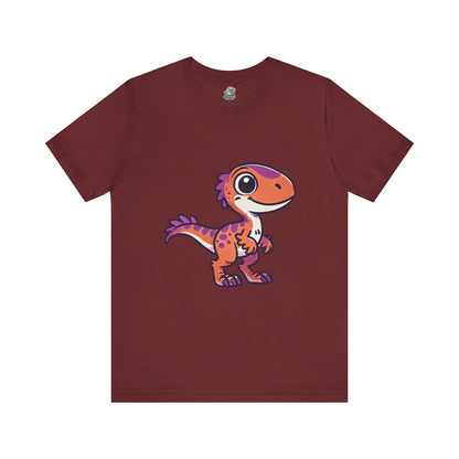 Adorable Cartoon Velociraptor Tee – Cute Dino Fun for All Ages! 🦖💜🧡 - Unisex Jersey Short Sleeve Tee Super Comfy Dino T-Shirt Gift