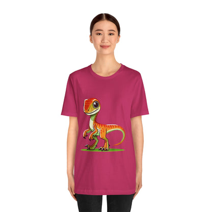 Bright & Bold Velociraptor Tee – Adorable Dino Fun in Orange & Green! 🦖🍊🌿 - Unisex Jersey Short Sleeve Tee Super Comfy Dino T-Shirt Gift