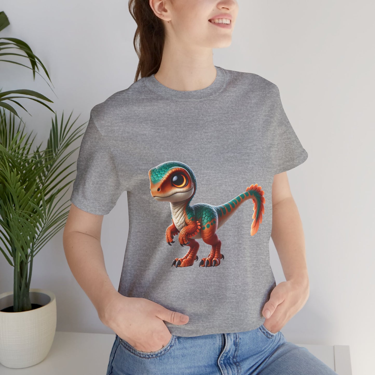 Adorable Scaled Velociraptor Tee – Vibrant Dino Charm in Teal & Orange! 🦖🍃🔥 - Unisex Jersey Short Sleeve Tee Super Comfy Dino T-Shirt Gift