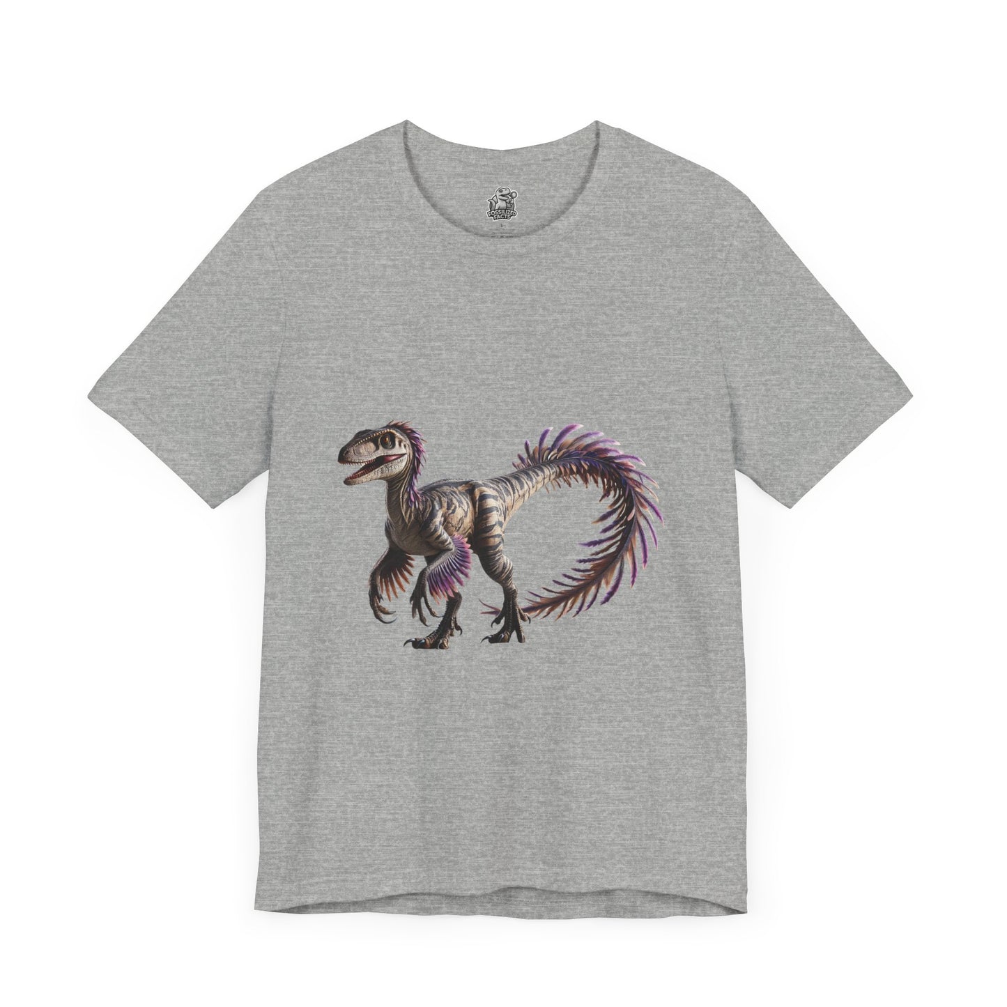 Fiercely Feathered Velociraptor Tee – A Wild Splash of Style and Prehistoric Flair! 🦖💜🌿 - Unisex Jersey Short Sleeve Tee Super Comfy Dino T-Shirt Gift