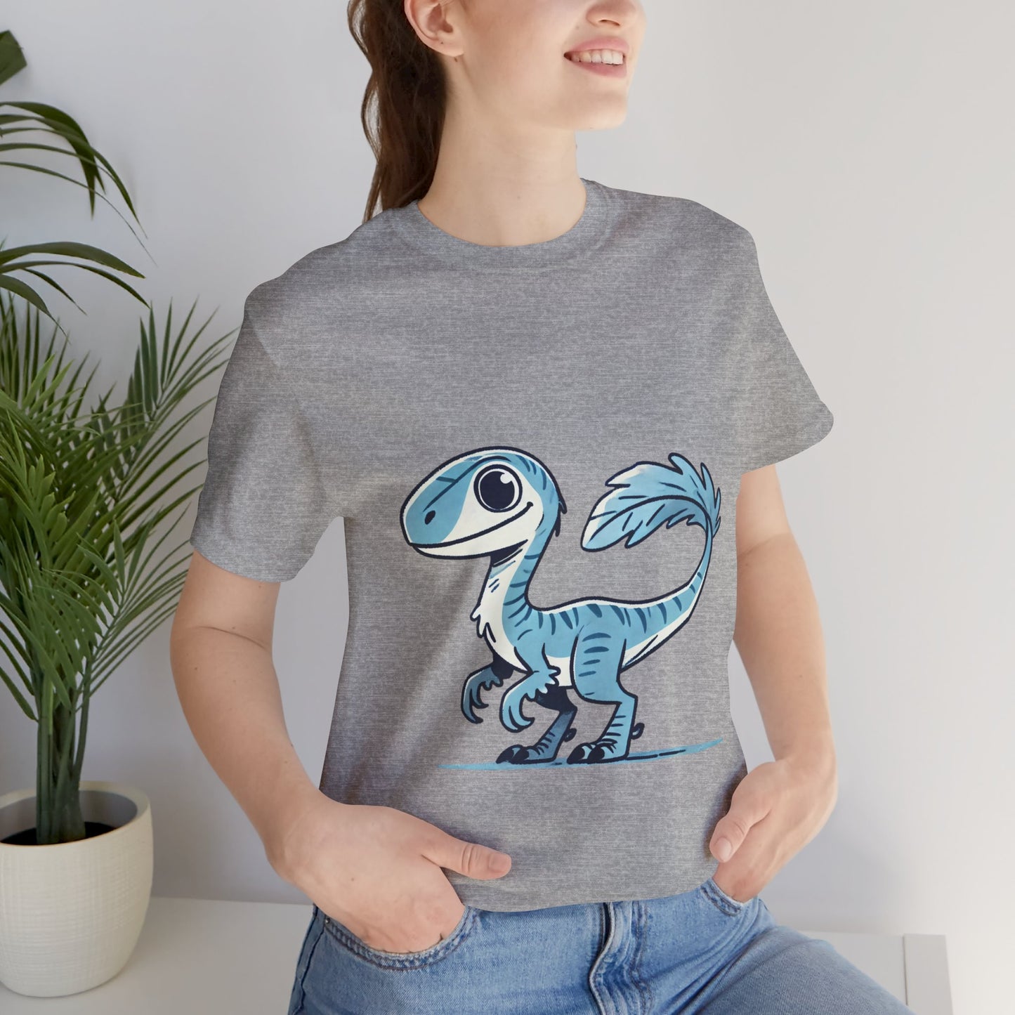 Charming Blue Velociraptor Tee – Cool Dino Style with a Playful Twist! 🦖💙❄️ - Unisex Jersey Short Sleeve Tee Super Comfy Dino T-Shirt Gift