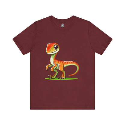 Bright & Bold Velociraptor Tee – Adorable Dino Fun in Orange & Green! 🦖🍊🌿 - Unisex Jersey Short Sleeve Tee Super Comfy Dino T-Shirt Gift