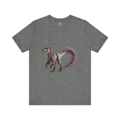 Fiercely Feathered Velociraptor Tee – A Wild Splash of Style and Prehistoric Flair! 🦖💜🌿 - Unisex Jersey Short Sleeve Tee Super Comfy Dino T-Shirt Gift