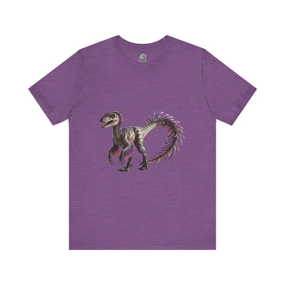 Fiercely Feathered Velociraptor Tee – A Wild Splash of Style and Prehistoric Flair! 🦖💜🌿 - Unisex Jersey Short Sleeve Tee Super Comfy Dino T-Shirt Gift