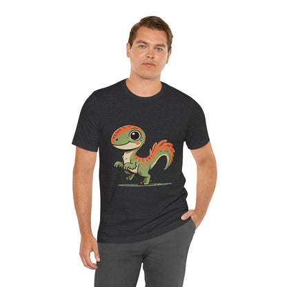 Charming Green & Orange Velociraptor Tee – Dino Delight for All Ages! 🦖🍃🧡 - Unisex Jersey Short Sleeve Tee Super Comfy Dino T-Shirt Gift