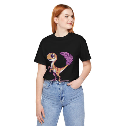 Friendly Feathered Velociraptor Tee – Cute Dino Style with a Splash of Color! 🦖💜🍃 – A Wild Splash of Style and Prehistoric Flair! 🦖💜🌿 - Unisex Jersey Short Sleeve Tee Super Comfy Dino T-Shirt Gift